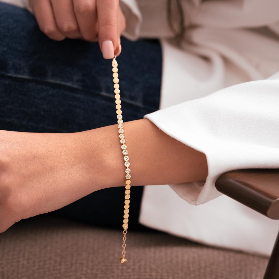 14 Carat Gold Bracelet with a Stone in the Center